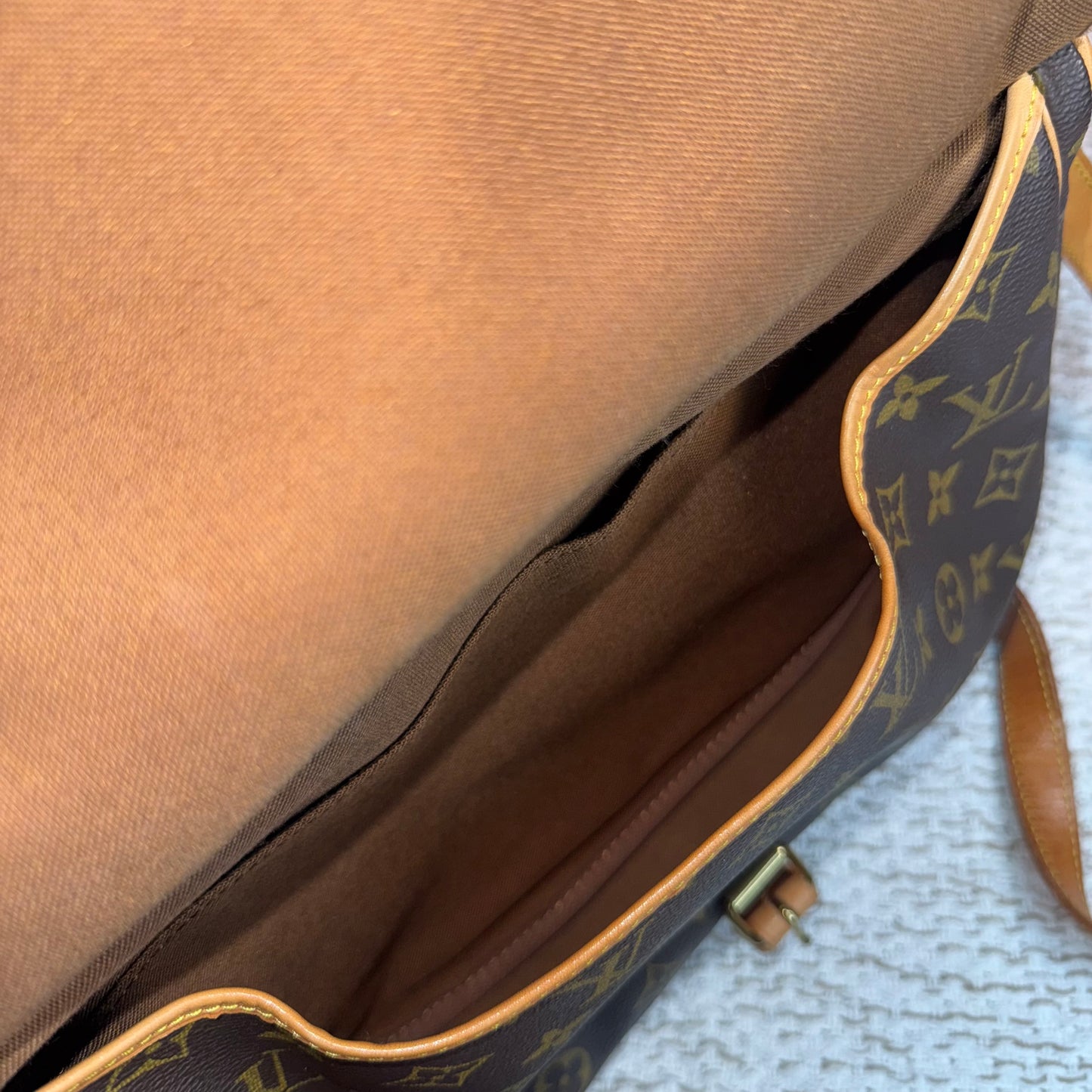 LOUIS VUITTON SAUMUR 30 in Monogram