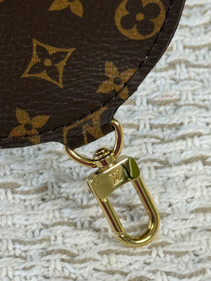 ROUND COIN PURSE in MONOGRAM CANVAS