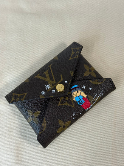 LOUIS VUITTON MONOGRAM CANVAS CHRISTMAS 2023 ANIMATION VIVIENNE KIRIGAMI POCHETTE SET