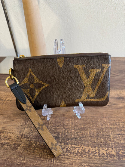 LOUIS VUITTON MAIN POUCH FROM TRIO POUCHES IN GIANT MONOGRAM