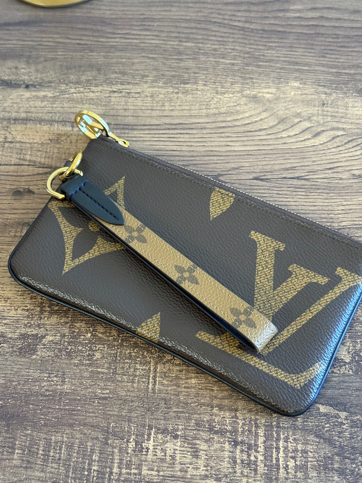 LOUIS VUITTON MAIN POUCH FROM TRIO POUCHES IN GIANT MONOGRAM
