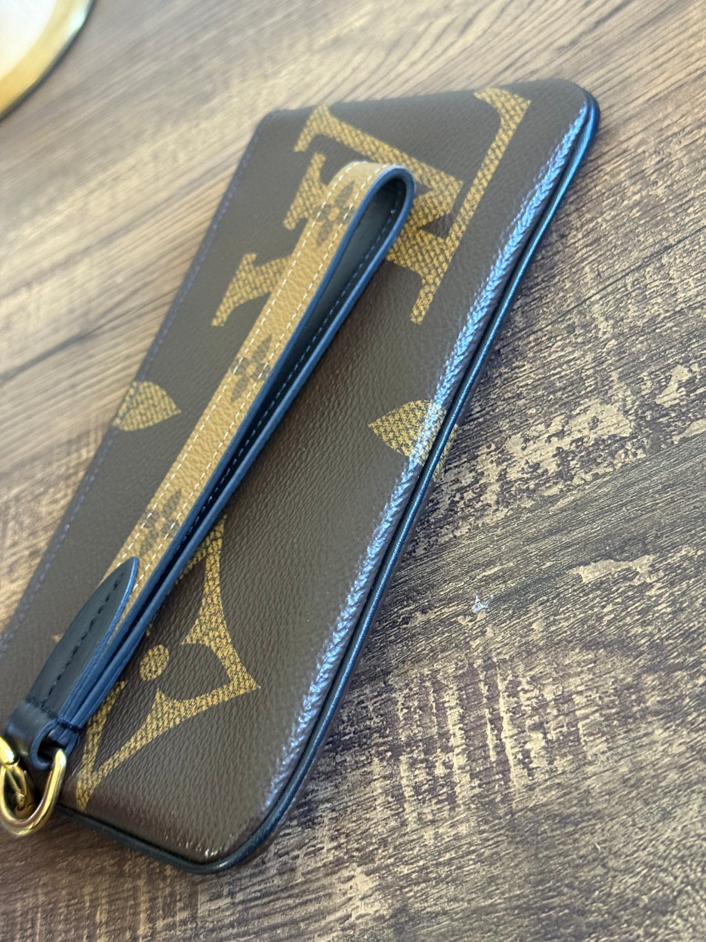 LOUIS VUITTON MAIN POUCH FROM TRIO POUCHES IN GIANT MONOGRAM