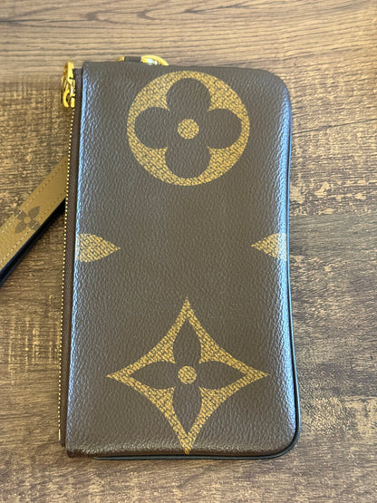 LOUIS VUITTON MAIN POUCH FROM TRIO POUCHES IN GIANT MONOGRAM