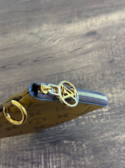 LOUIS VUITTON TRIO POUCH REVERSE MONOGRAM