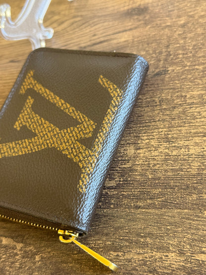 LOUIS VUITTION ZIPPED AROUND CARD WALLET IN REVERSE MONOGRAM