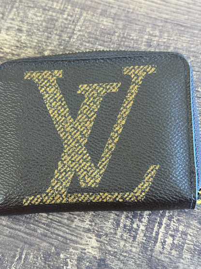 LOUIS VUITTION ZIPPED AROUND CARD WALLET IN REVERSE MONOGRAM