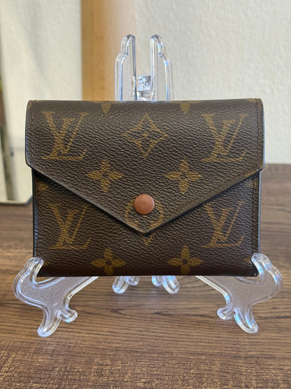 LOUIS VUITTON VICTORINE TRI-FOLD WALLET