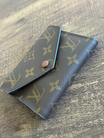 LOUIS VUITTON VICTORINE TRI-FOLD WALLET