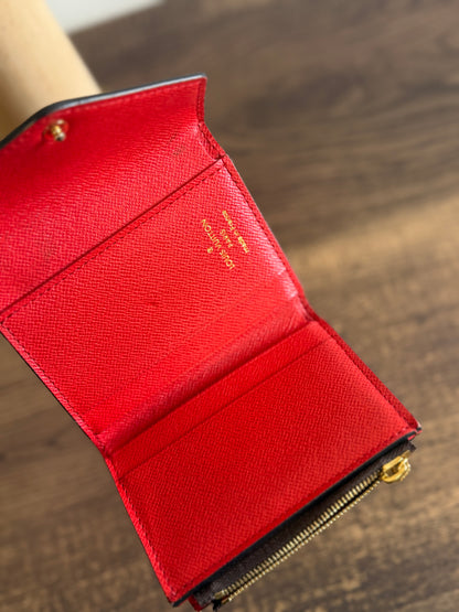 LOUIS VUITTON ZOE WALLET IN DAMIER EBENE WITH RED LEATHER