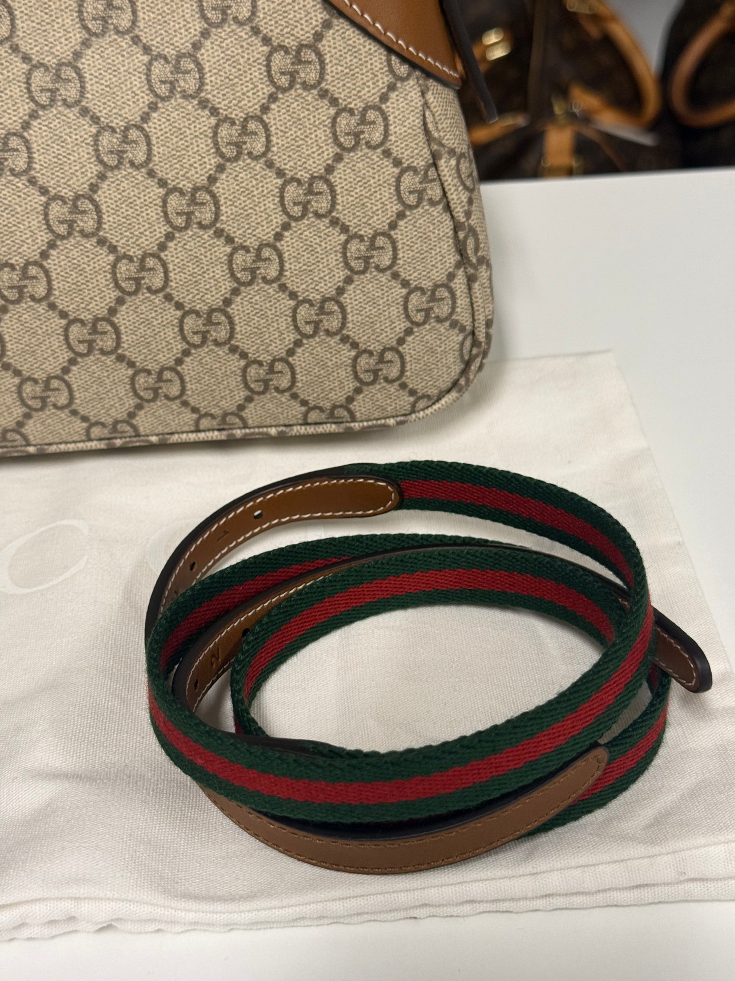 GUCCI GG EMBLEM SMALL SHOULDER BAG
