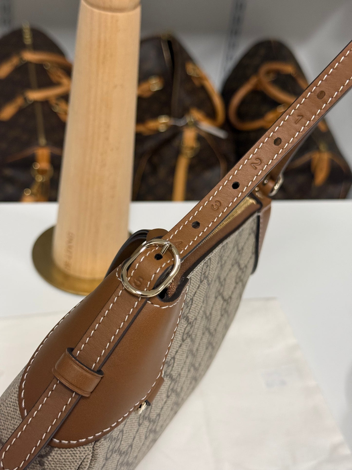 GUCCI GG EMBLEM SMALL SHOULDER BAG