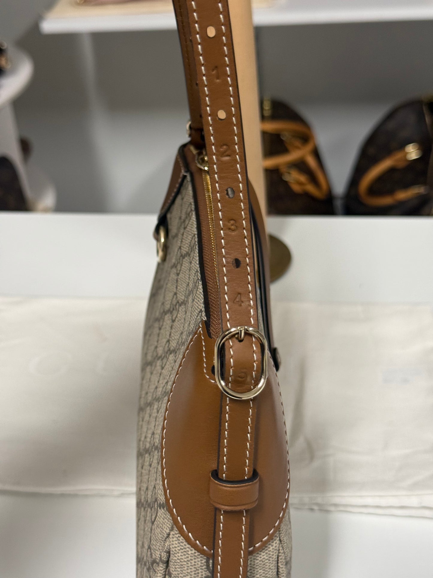 GUCCI GG EMBLEM SMALL SHOULDER BAG