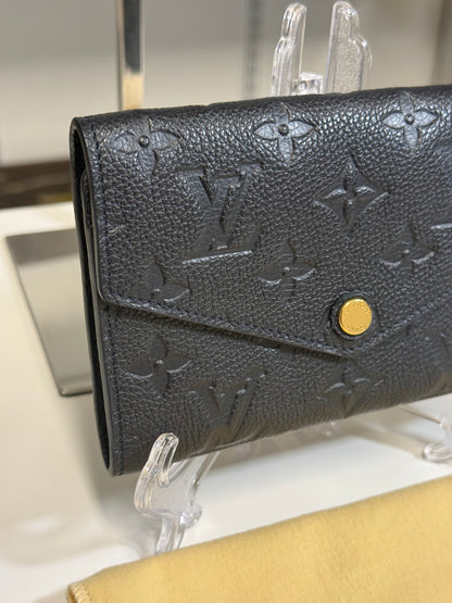 Louis Vuitton Compact Curieuse Wallet in Black Monogram Empreinte leather