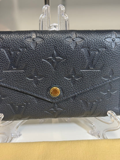 Louis Vuitton Compact Curieuse Wallet in Black Monogram Empreinte leather