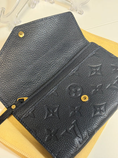 Louis Vuitton Compact Curieuse Wallet in Black Monogram Empreinte leather