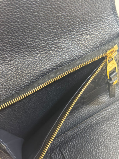 Louis Vuitton Compact Curieuse Wallet in Black Monogram Empreinte leather